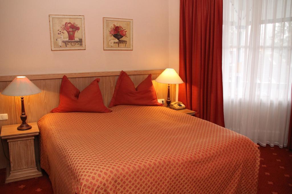 Romantik Im Hotel Villa Roehl Timmendorfer Strand Oda fotoğraf